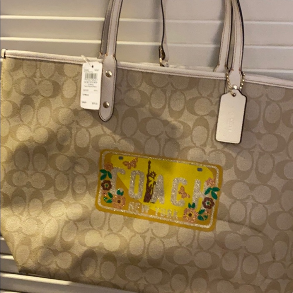 Authentic coach purse never used tags on it.